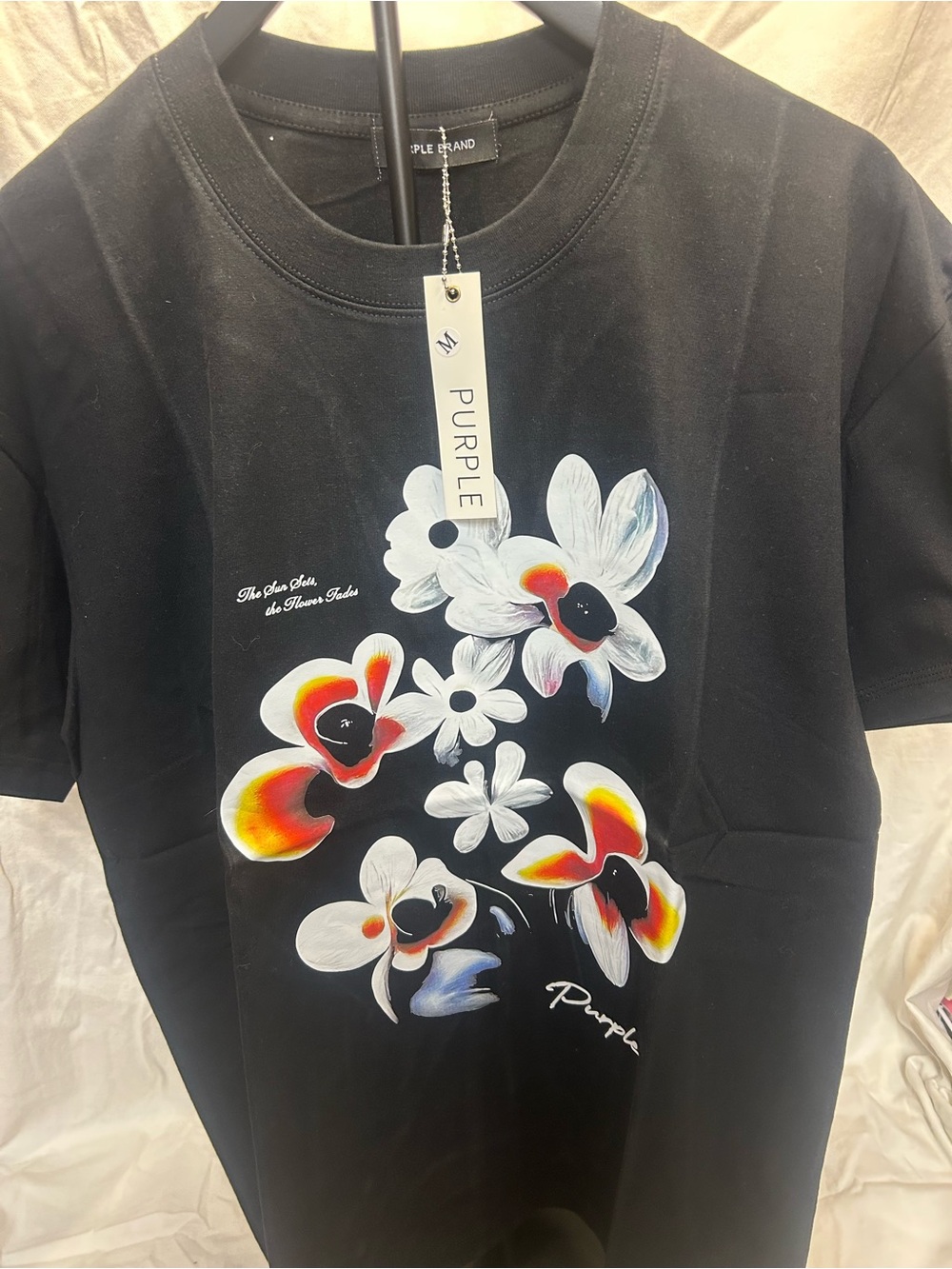 Purple brand flower label Tee- size medium